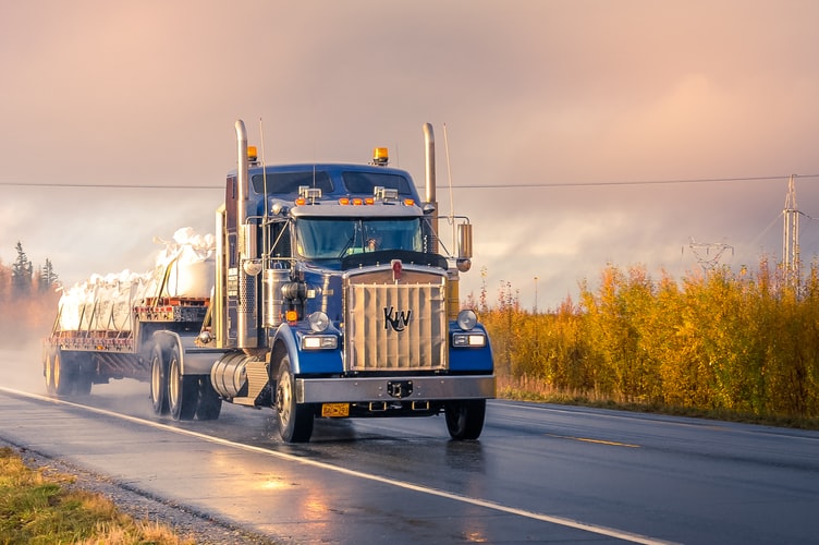 truck driving down highway