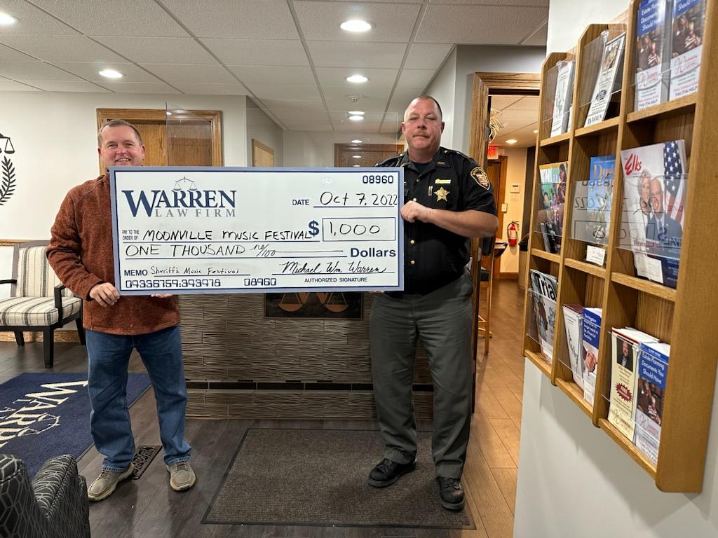 warren law firm donation to Festival