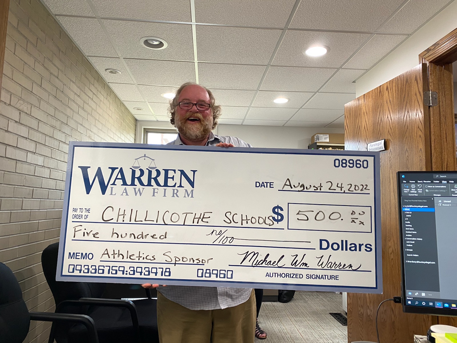 warren law firm donation to schools