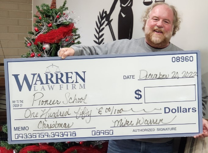 mike warren charity donation to the Pioneer School