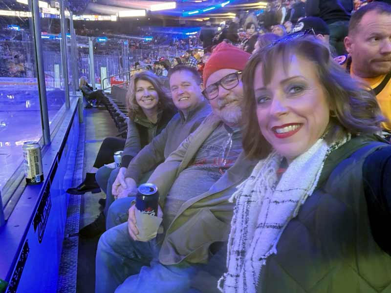 The staff of Warren Law Firm supporting KIDS DAY at the Columbus Blue Jackets. 